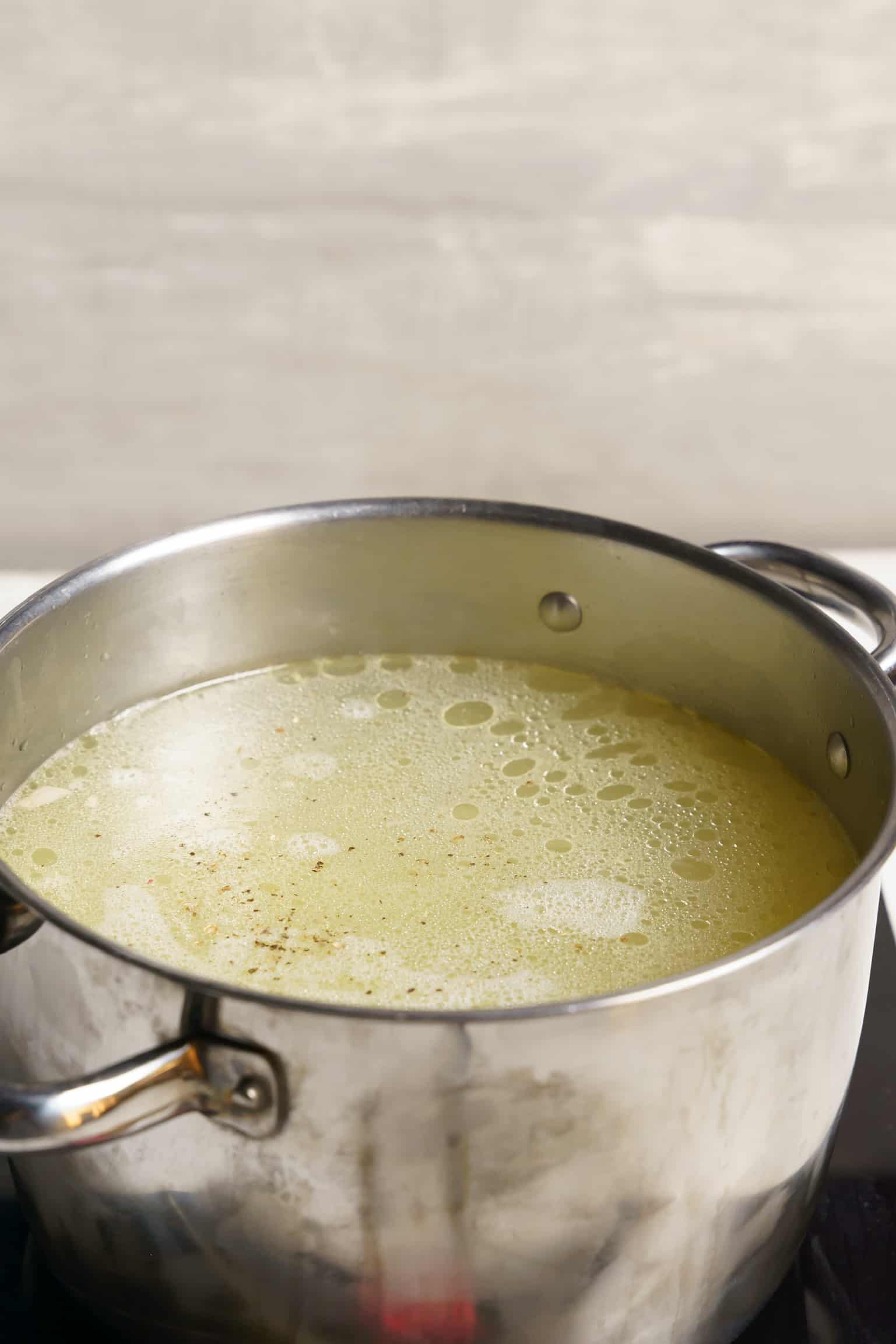 Cook the rice in the chicken broth